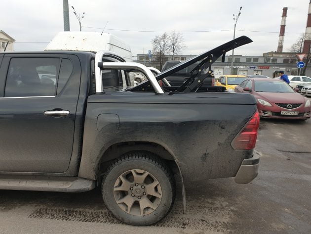 Крышка в два положения с дугами для пикапа Toyota Revo